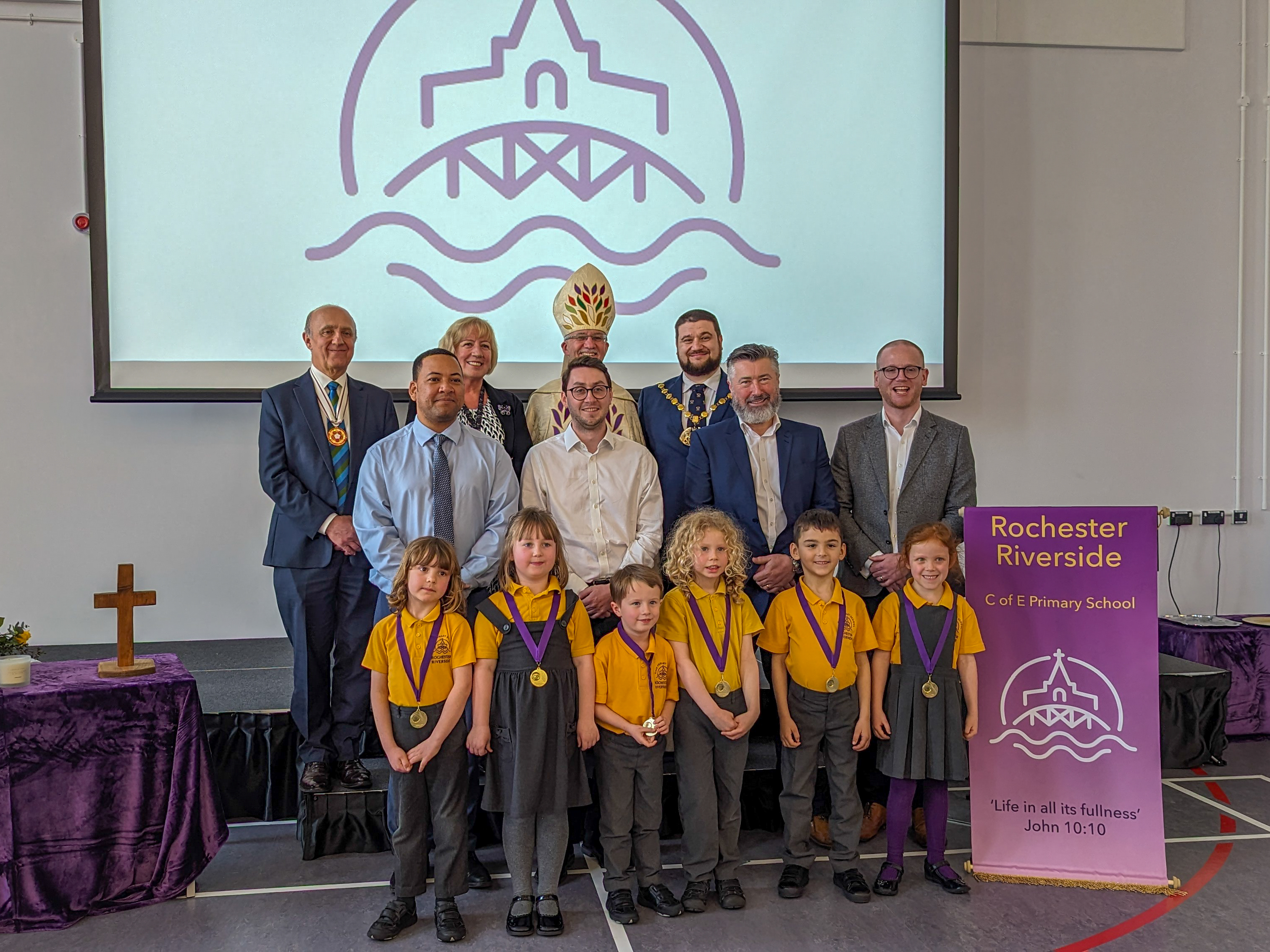 Civic dignataries, and representatives from the Trust and the developers join the medal winning pupils