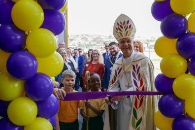 Bishop Jonathan cuts ribbon