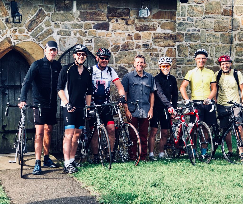 Cycling group gets ready to go outside church