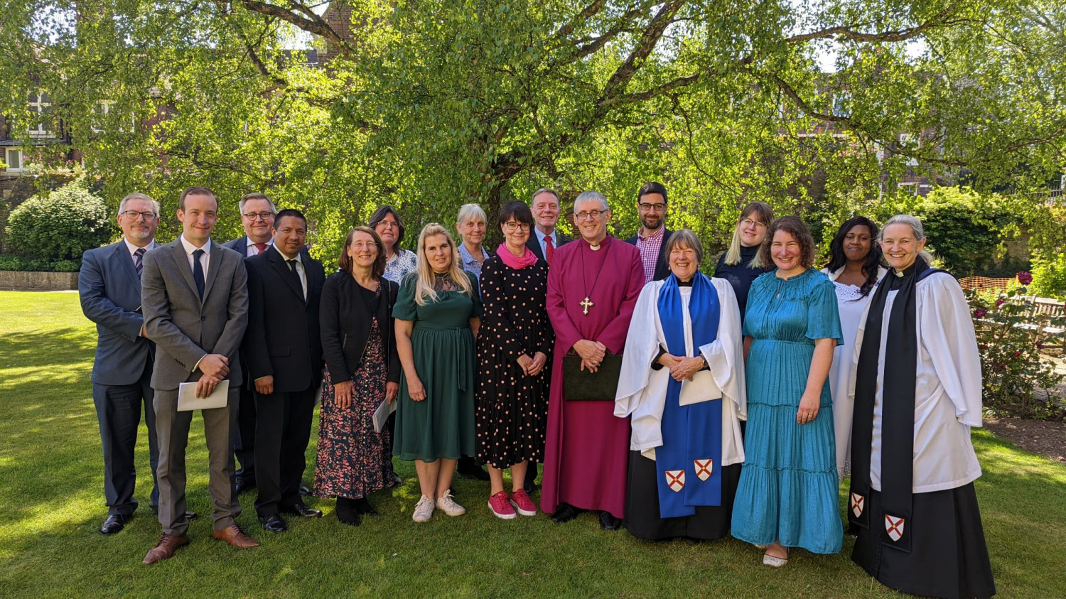 A group shot of the new LLms with Bishop Simon